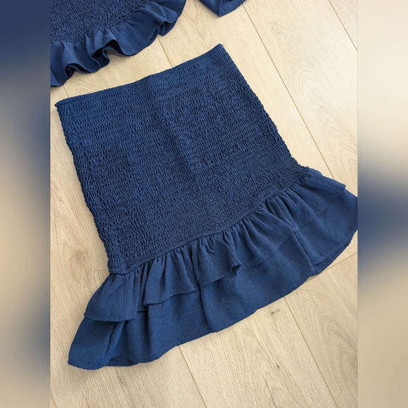 idem ditto off-the-shoulder smocked crop top with a matching ruffled mini skirt - Picture 2 of 8